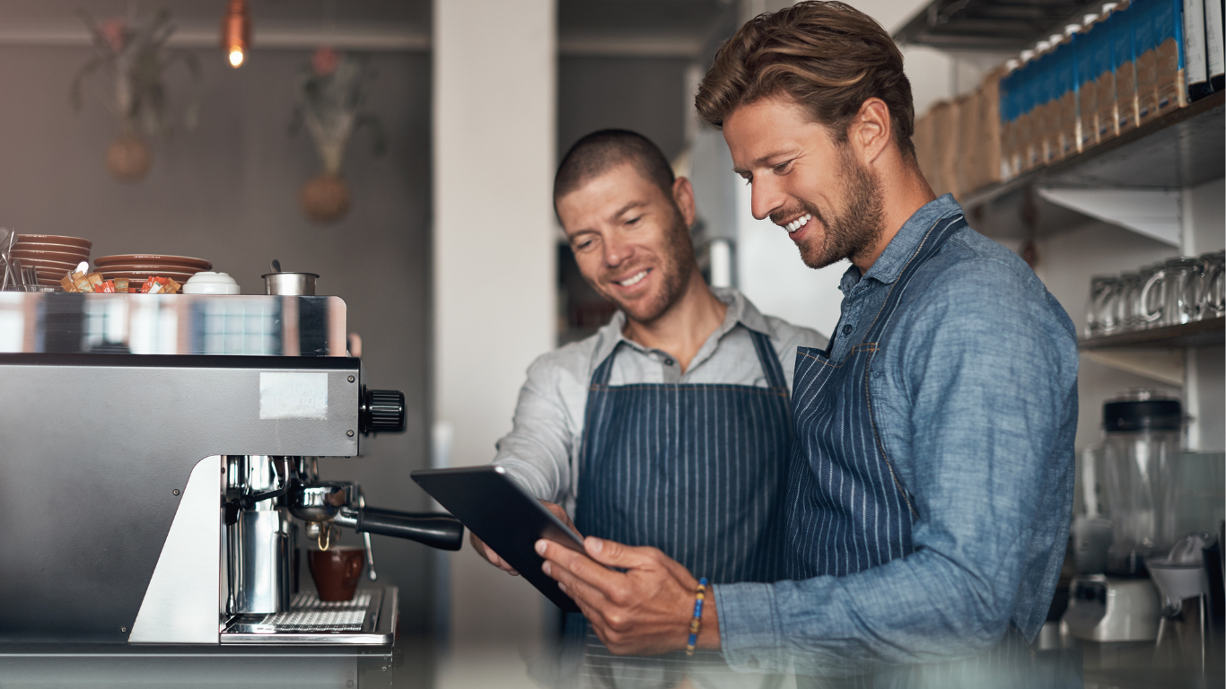 men in cafe doing inventory